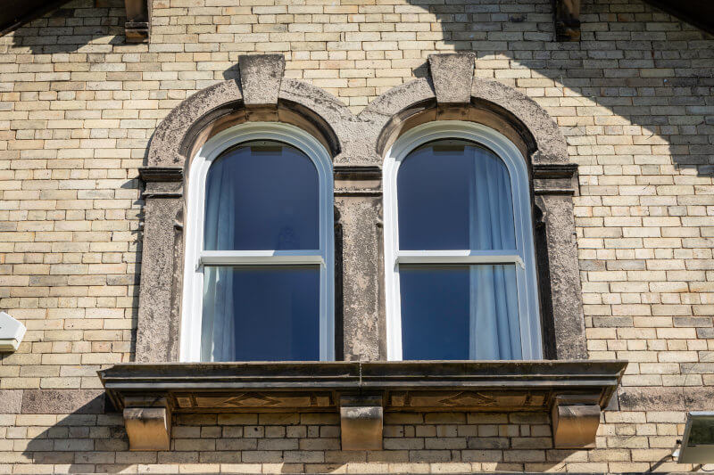 arched vertical sliders foxhill house