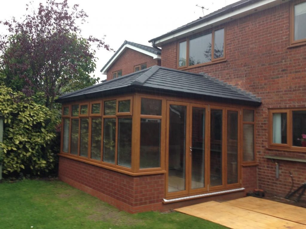 Golden Oak conservatory with tiled roof