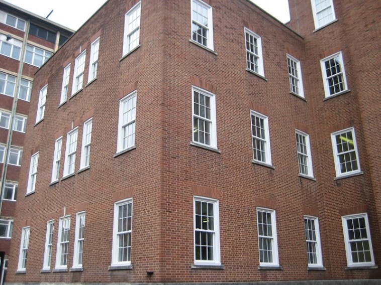 Sash window replacement project for Zochonis Building