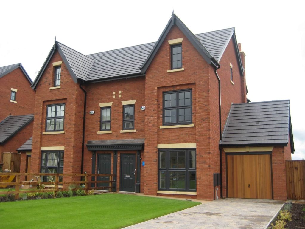 uPVC windows and composite doors in Anthracite Grey at The Fairways