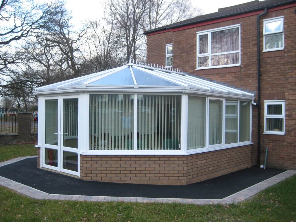 White uPVC windows, doors and conservatory roof fitted at Kempton Court in Sale