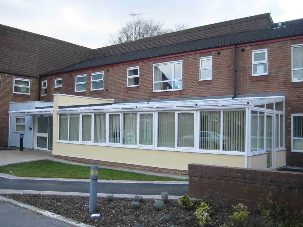 sun lounge extension with white uPVC windows and doors