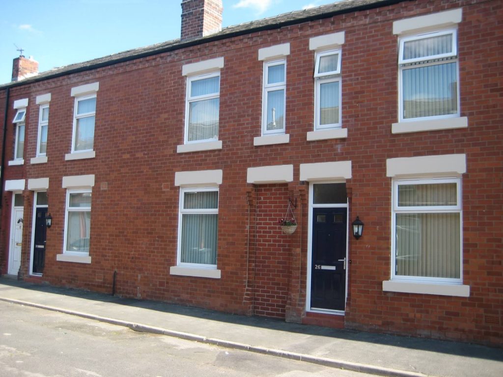 White uPVC windows, black composite door, Corrigan Street