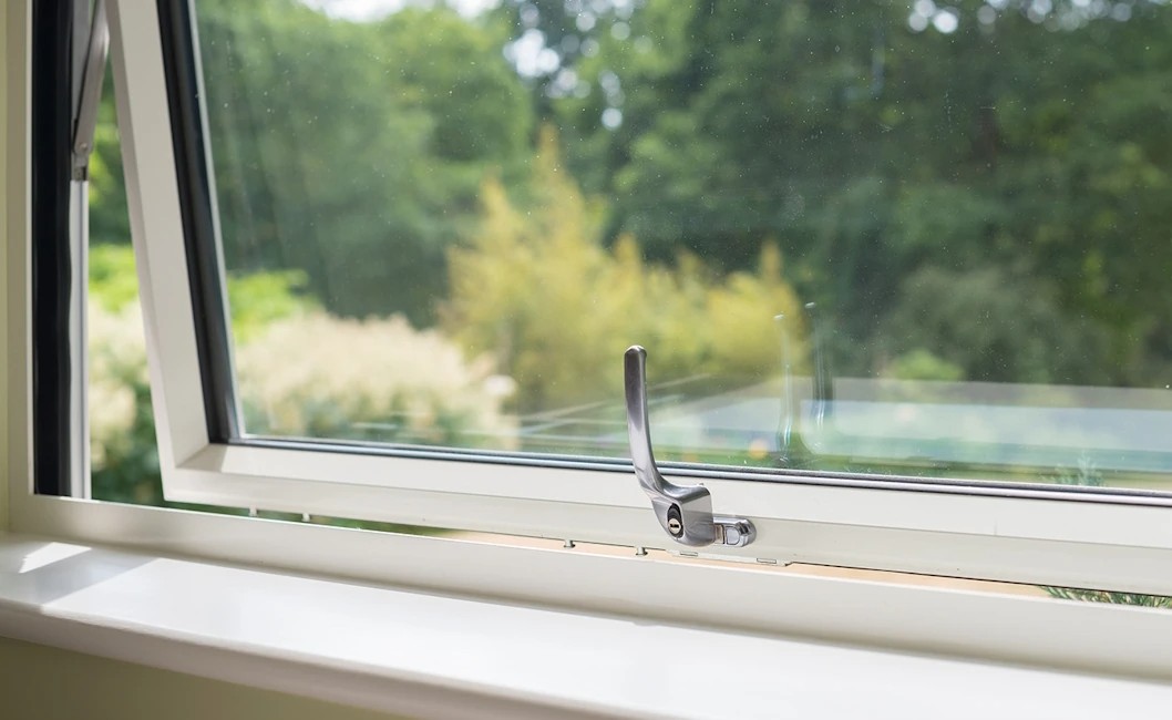 Triple glazed casement windows overlooking a garden in Manchester